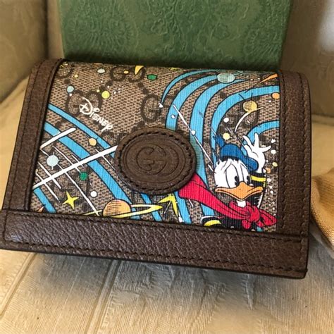 gucci x donald duck wallet|limited edition Gucci x Disney Donald Duck rocket compact wallet .